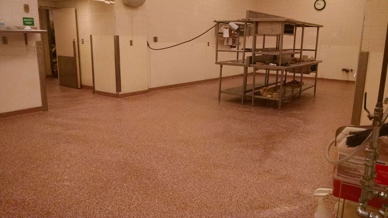 Another example photo of red JetRock flooring applied to a hospital kitchen floor