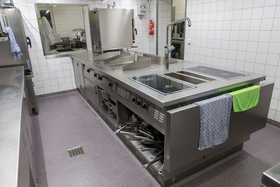 A commercial kitchen with epoxy flooring installed