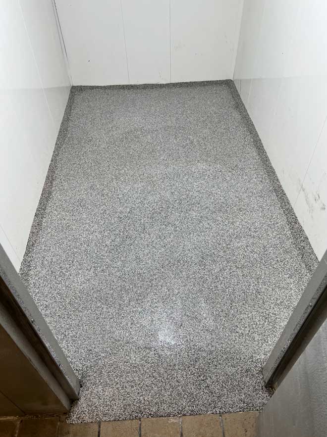 A walk-in cooler finished with a final top layer of JetRock epoxy flooring